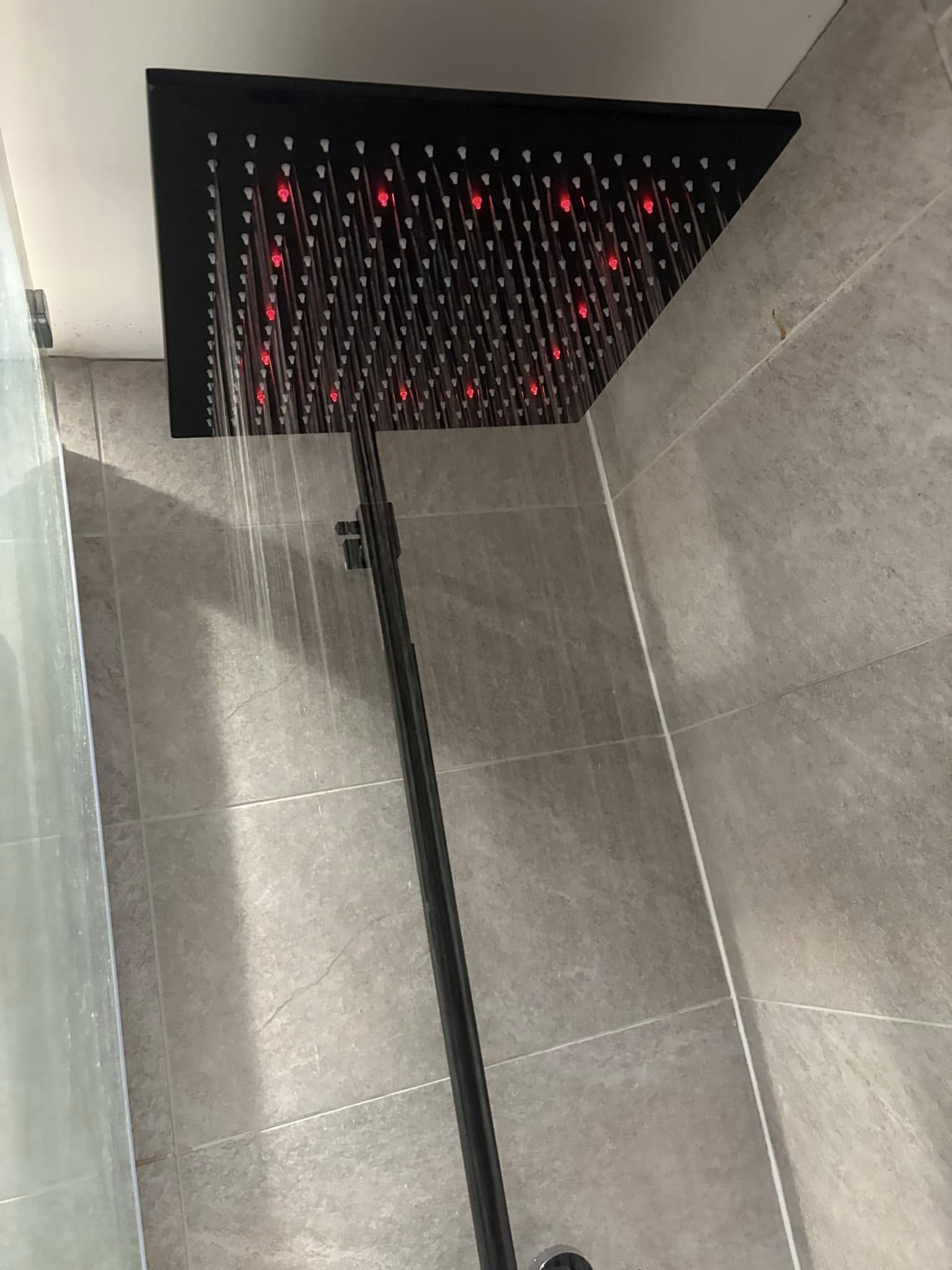 Modern shower head for a newly refurbished shower